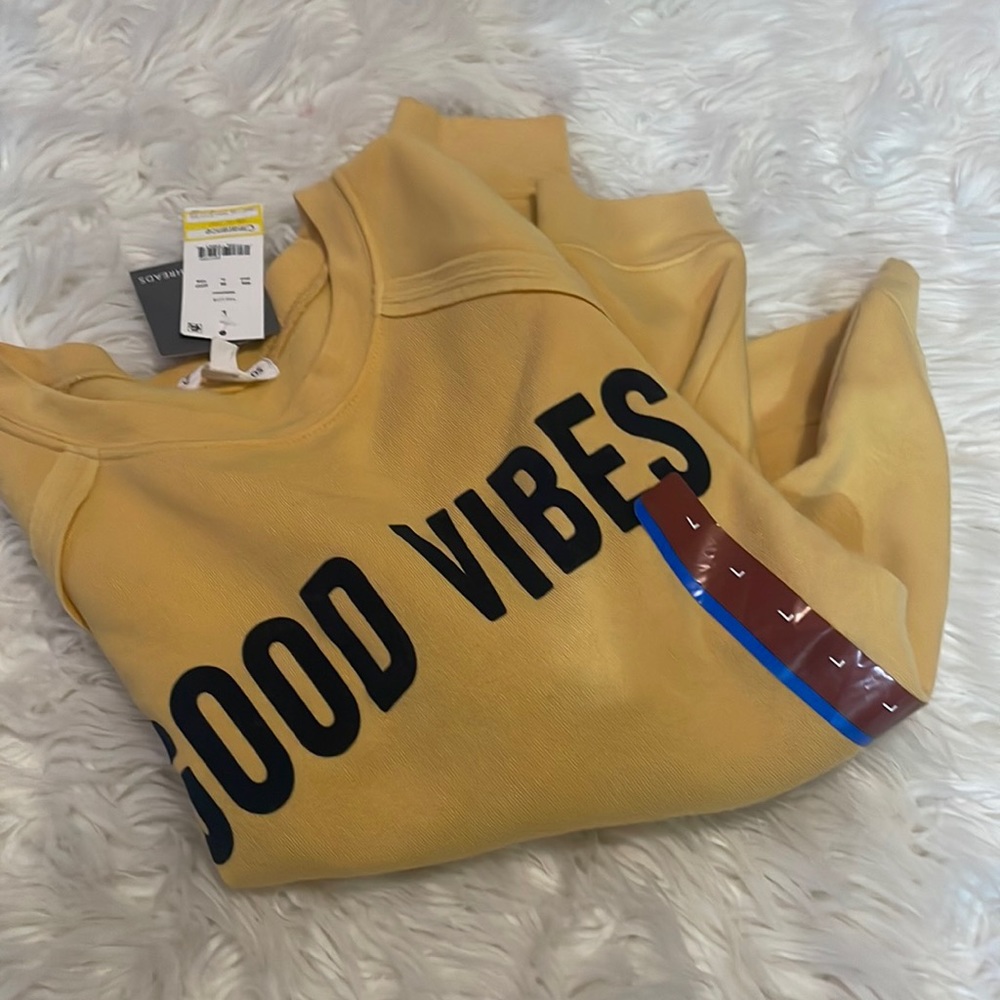yellow crew neck